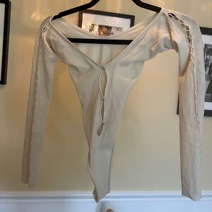 White Fox Long Sleeve Bodysuit with Cutout Details